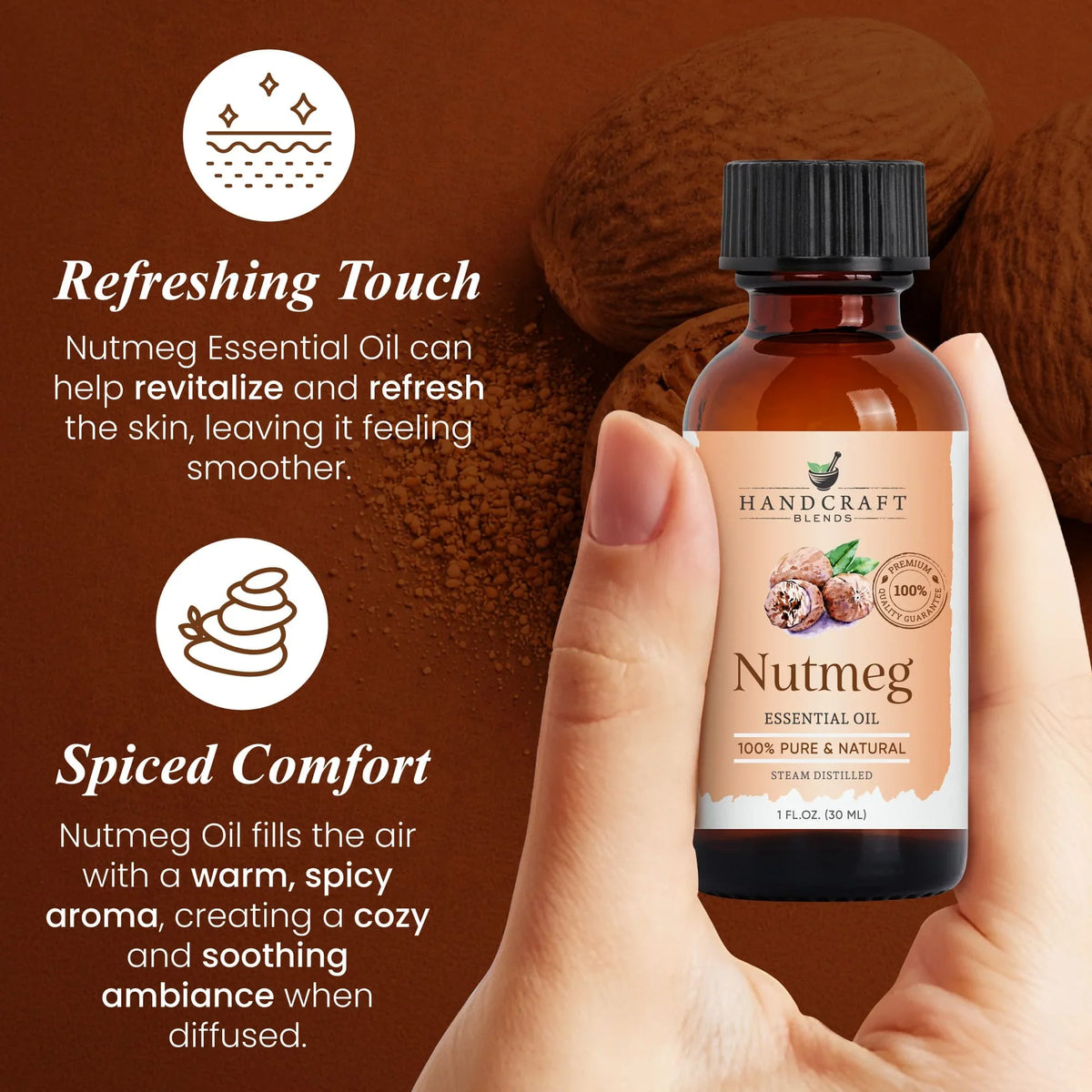 Hand holding a bottle of nutmeg essential oil with nutmeg seeds and powder in the background