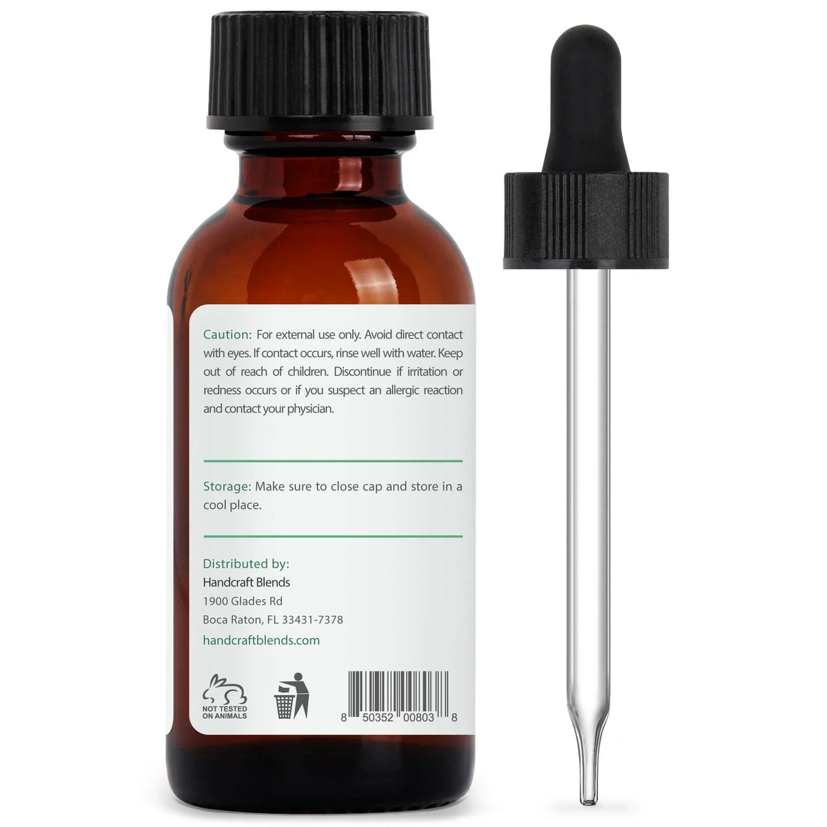 Amber glass essential oil bottle with dropper and caution label on white background