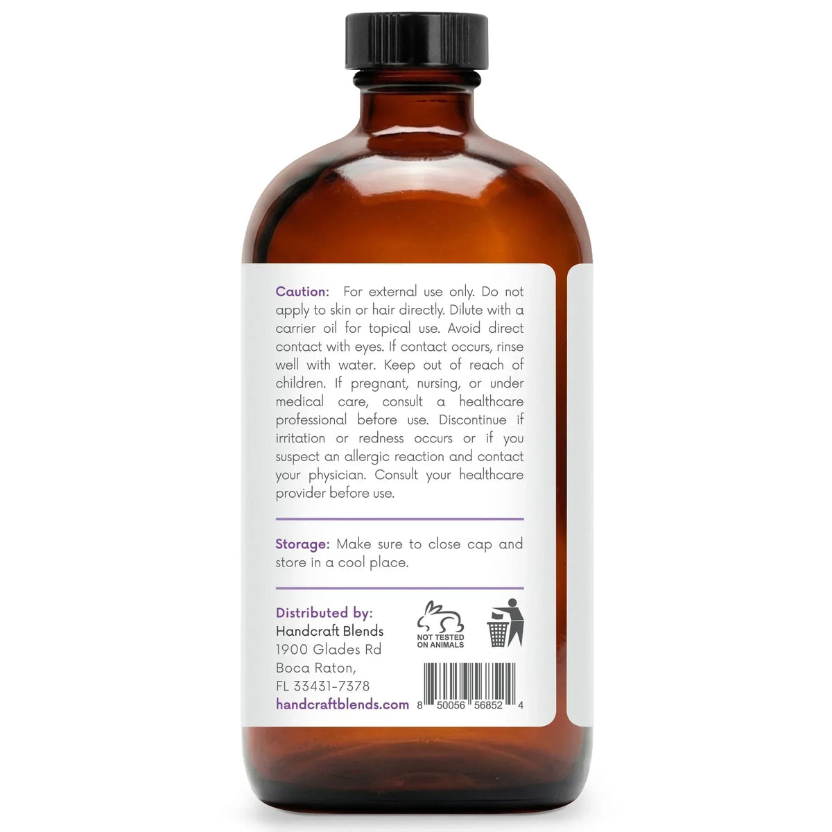 16 oz amber glass essential oil bottle with safety and storage instructions on the label