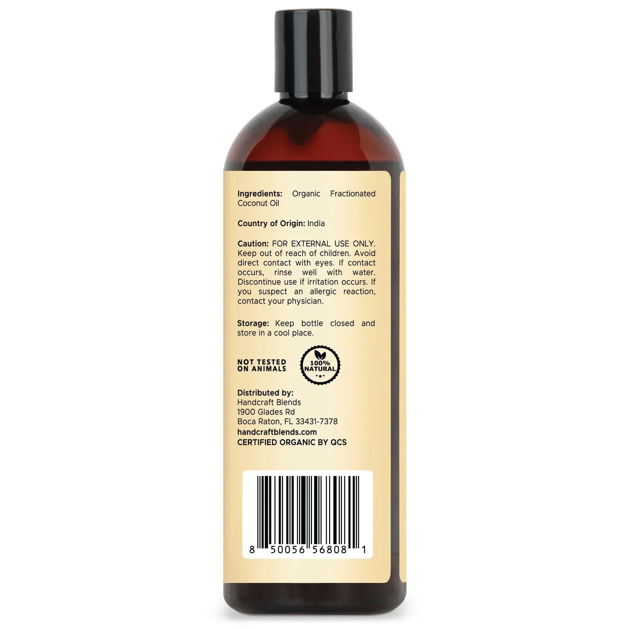 Brown plastic bottle of organic fractionated coconut oil with ingredients, usage instructions, and barcode on the back label.