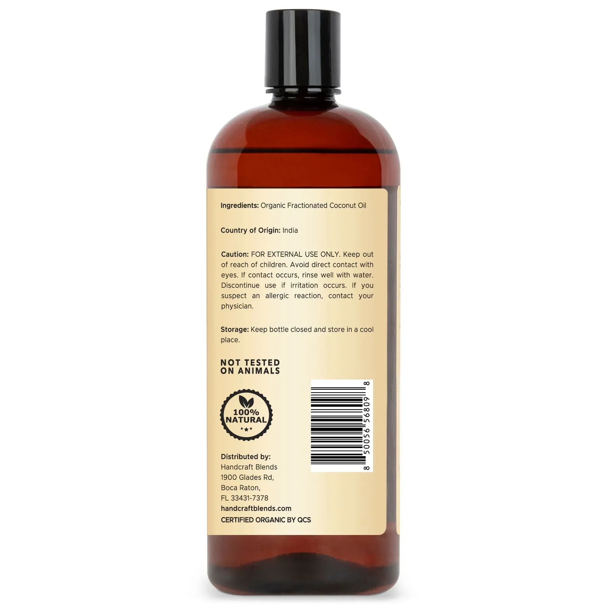 Back label of a 28oz amber bottle of organic fractionated coconut oil with black cap.