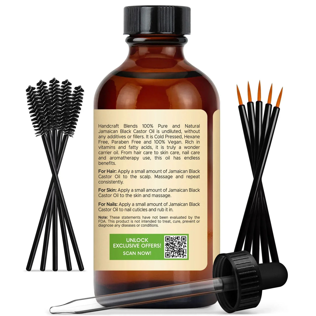 Amber glass bottle of Jamaican black castor oil with applicator brushes and dropper
