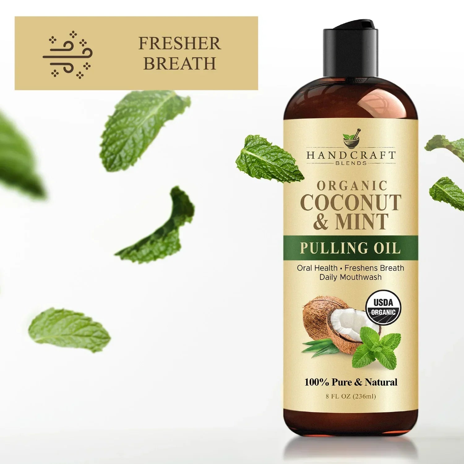 Organic coconut and mint pulling oil mouthwash bottle with mint leaves and fresher breath label