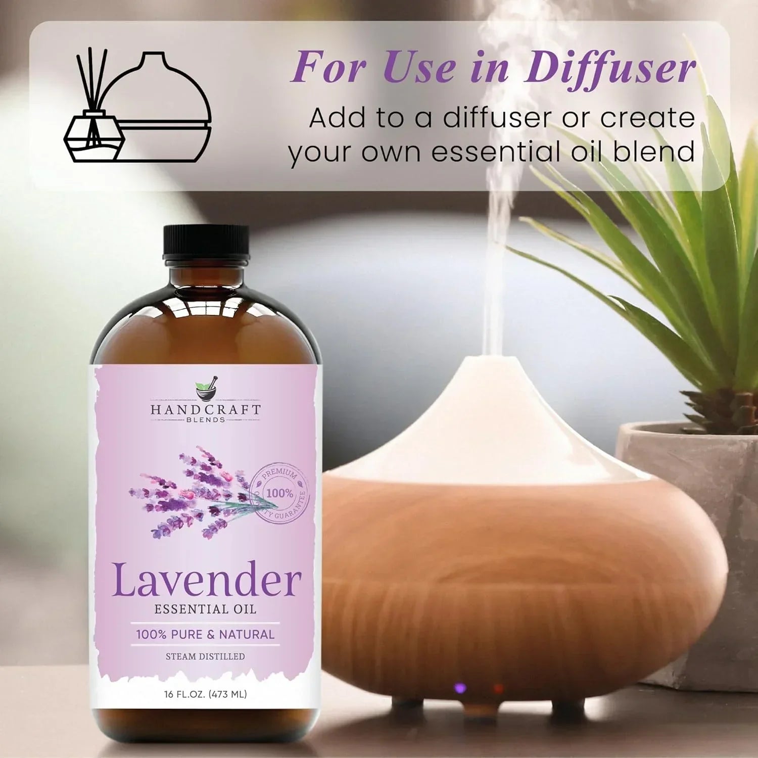 Lavender essential oil bottle next to diffuser and plant, ideal for aromatherapy use.