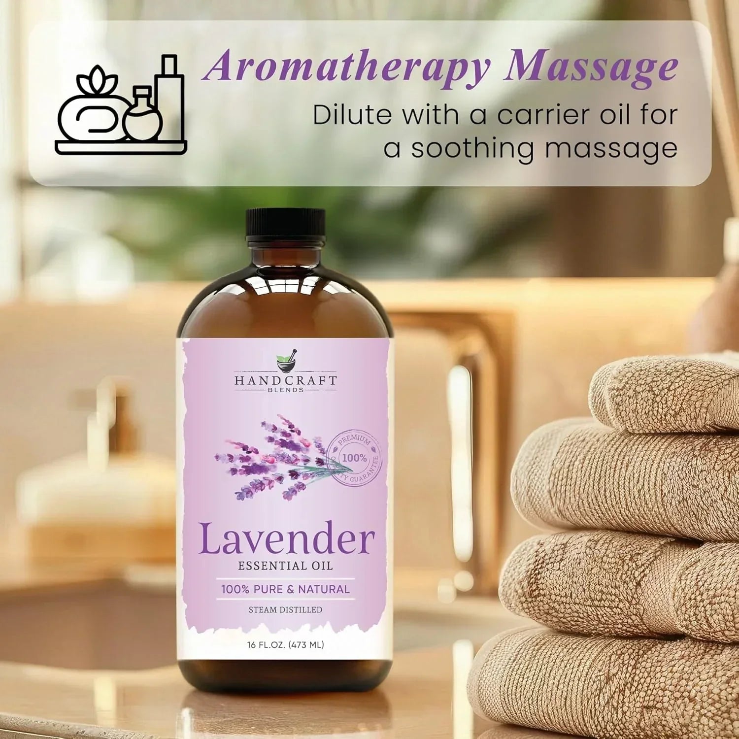 Lavender essential oil bottle for aromatherapy massage, with towels and spa setting