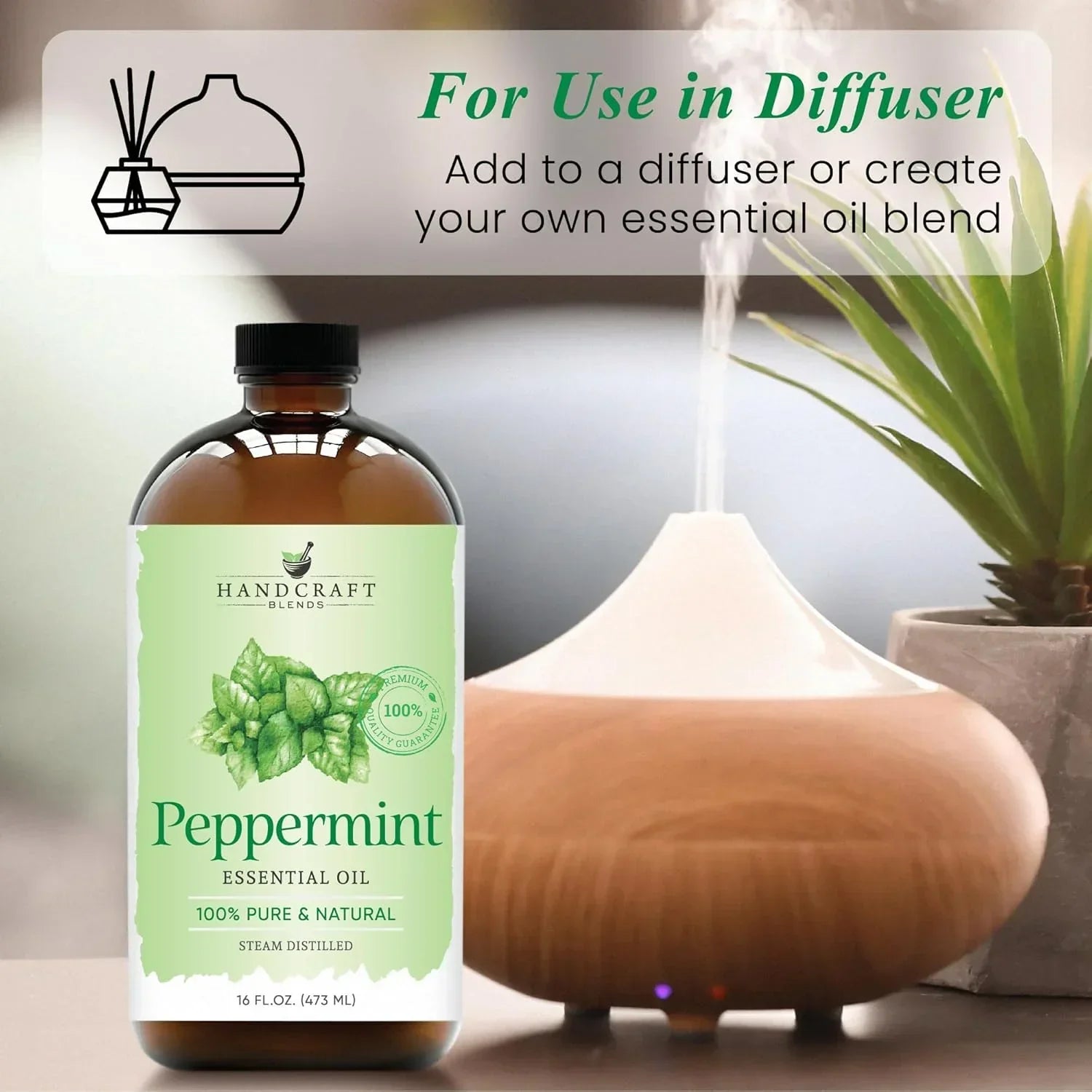 Peppermint essential oil bottle next to an active aroma diffuser, ideal for aromatherapy use.