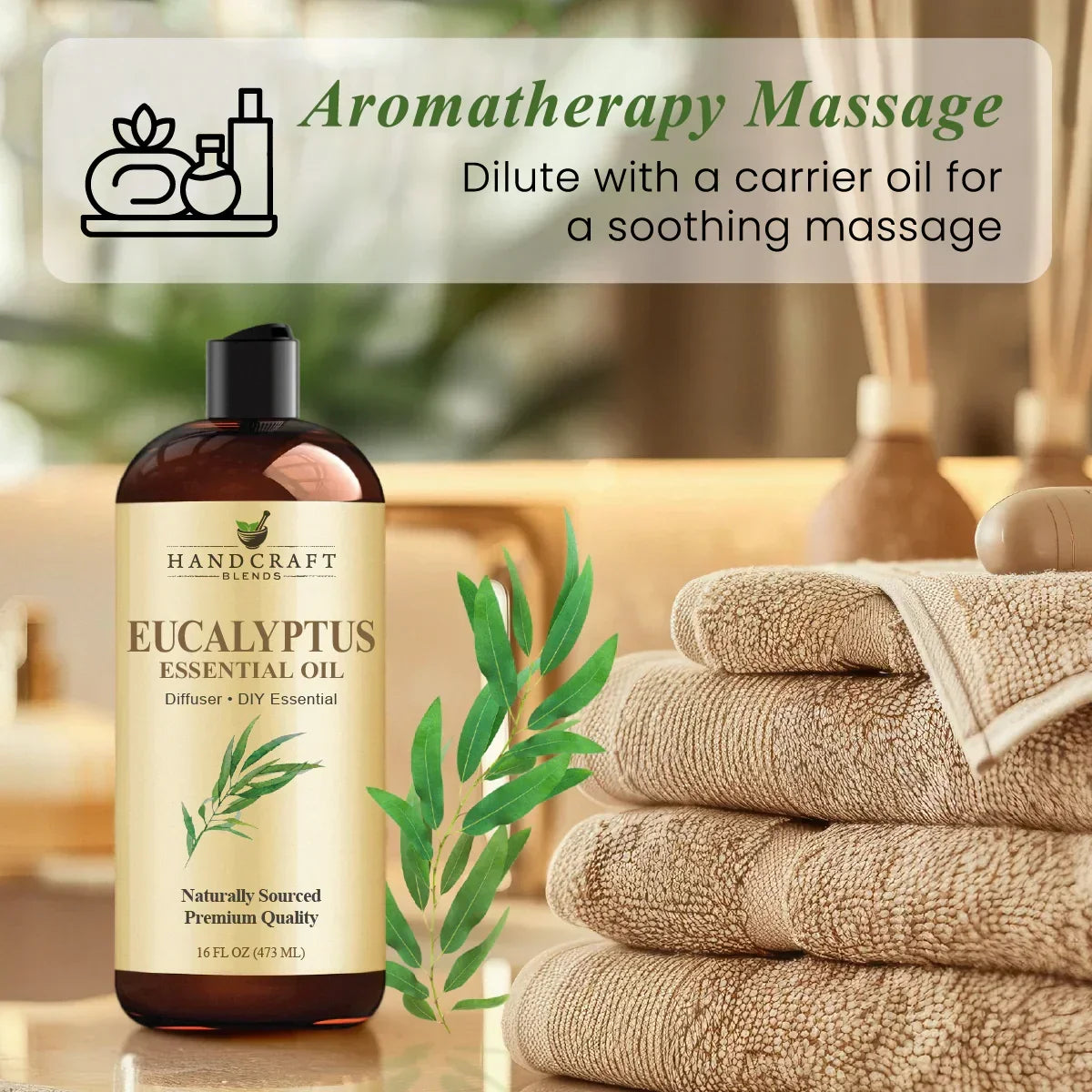 Eucalyptus essential oil bottle with spa towels and massage accessories for aromatherapy.