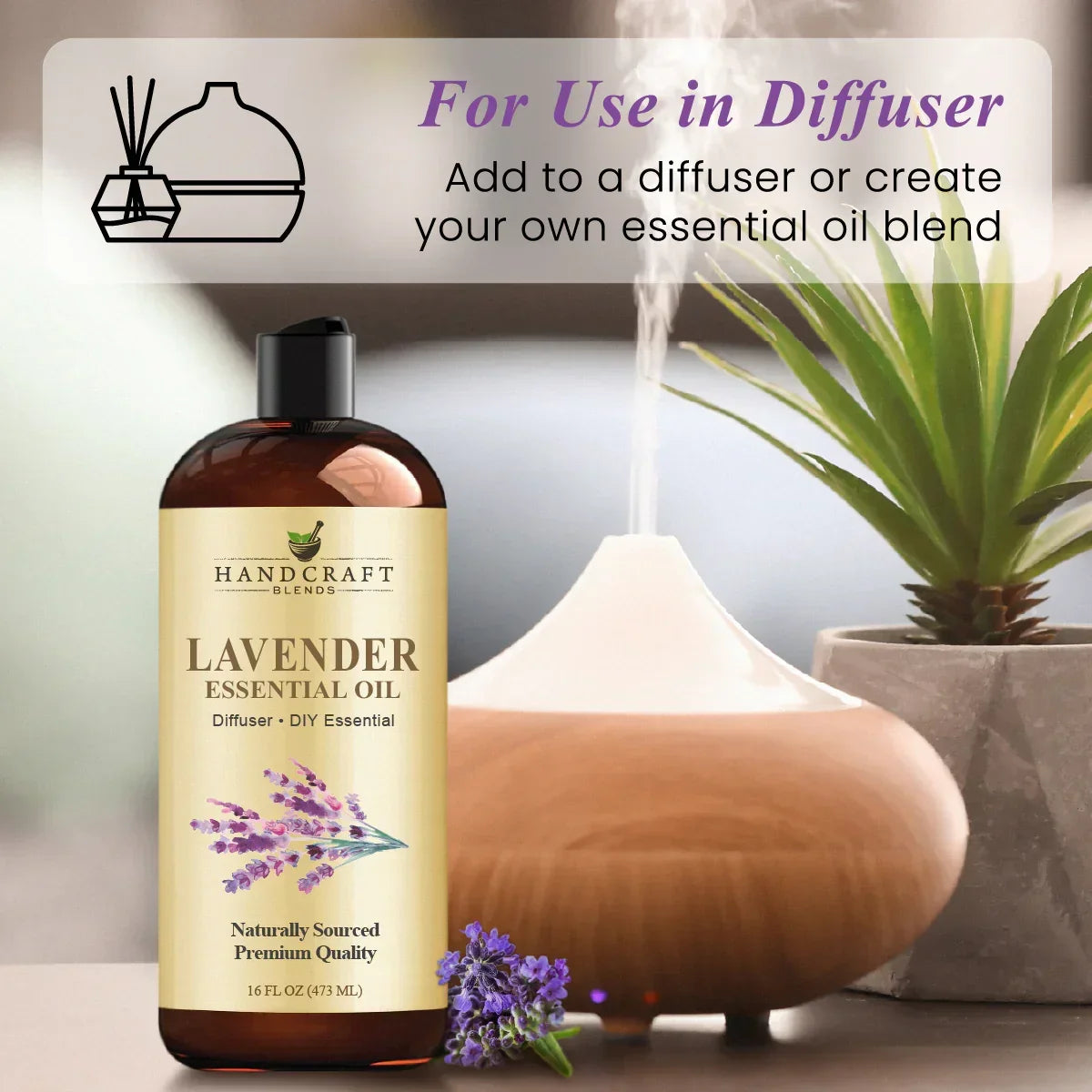 Lavender essential oil bottle beside diffuser, lavender flowers, and potted plant on table.