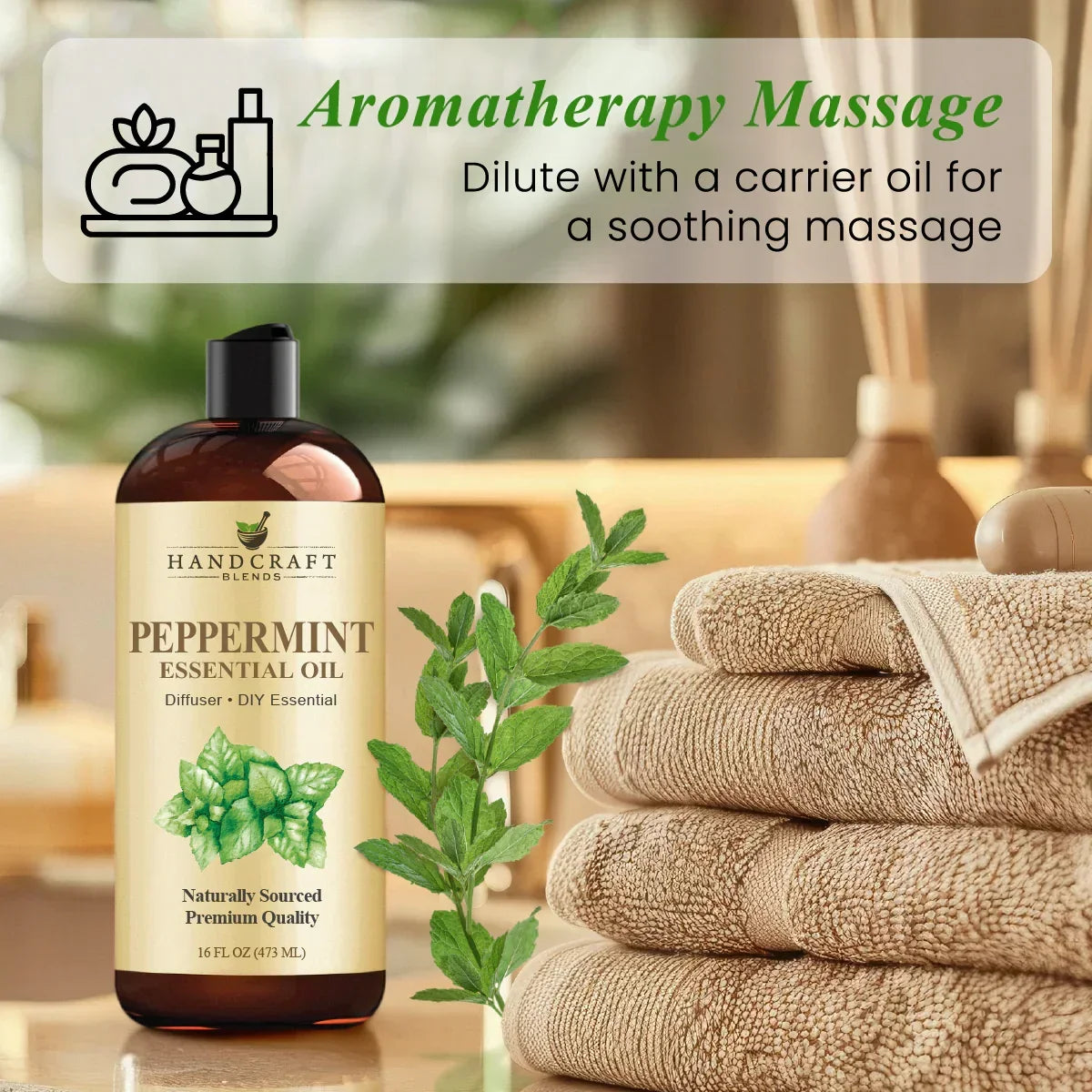 Peppermint essential oil bottle with mint leaves, spa towels, and aromatherapy decor.