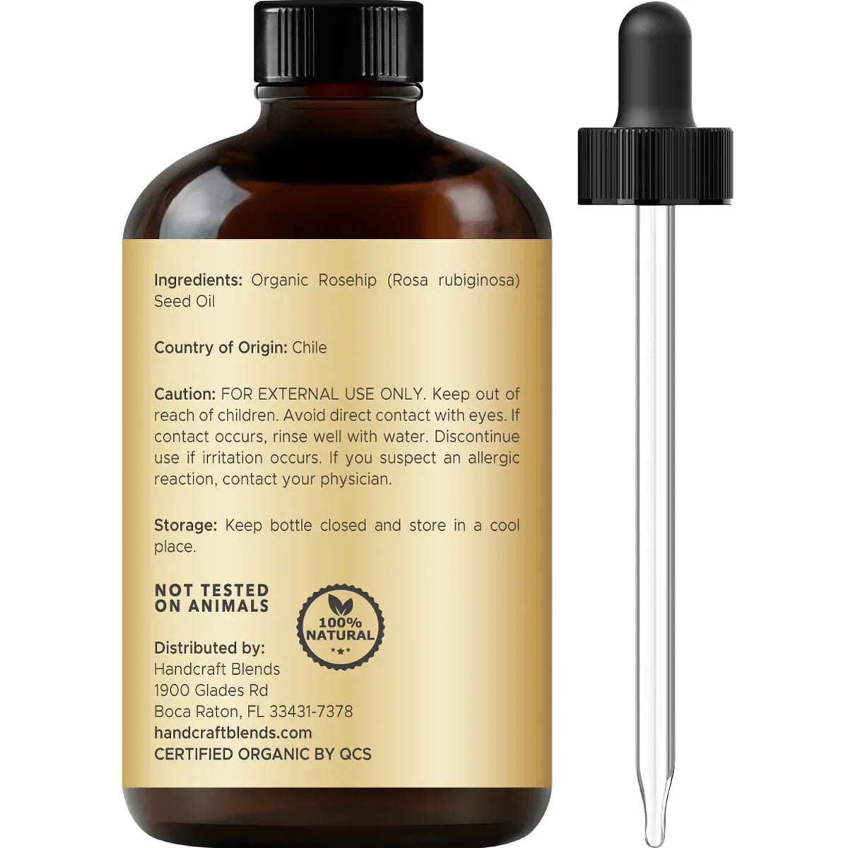Amber glass bottle of organic rosehip seed oil with dropper and product label details.