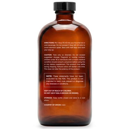 Amber glass bottle of organic MCT oil with dosage and caution details on the label, white background.